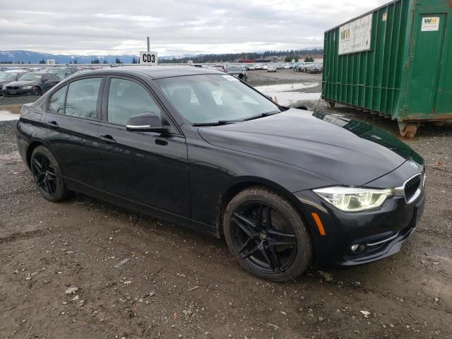 WBA8D9C52JEB35701 - 2018 BMW 330 XI BLACK photo 4