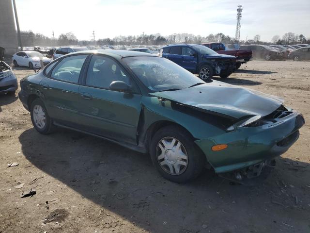 1FAFP53U6XA172769 - 1999 FORD TAURUS SE GREEN photo 4