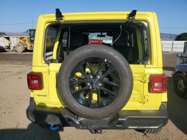 1C4JJXP64NW229242 - 2022 JEEP WRANGLER U SAHARA 4XE YELLOW photo 6