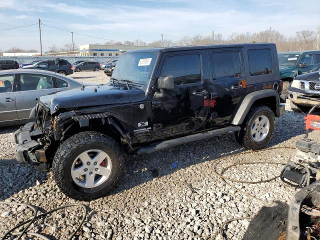 1J4GA39189L790727 - 2009 JEEP WRANGLER U X BLACK photo 1