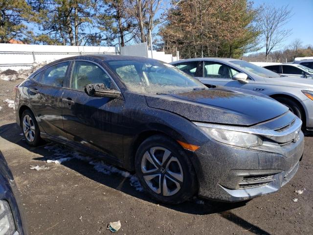 2HGFC2F58JH590348 - 2018 HONDA CIVIC LX BLACK photo 4