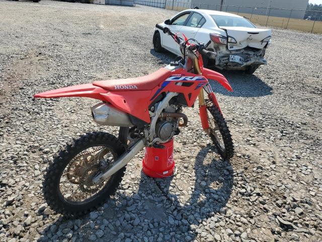 JH2ME1238PK504737 - 2023 HONDA CRF250 R RED photo 4