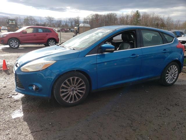 1FAHP3N23CL389509 - 2012 FORD FOCUS TITANIUM BLUE photo 1