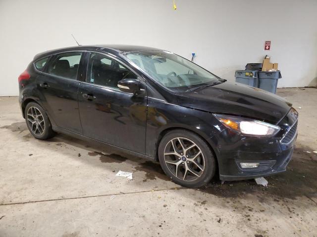 1FADP3M26JL208299 - 2018 FORD FOCUS SEL BLACK photo 4