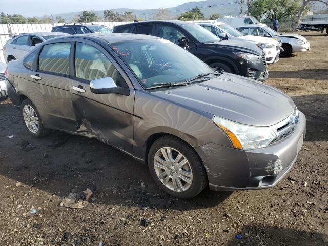 1FAHP3HN2AW273879 - 2010 FORD FOCUS SEL GRAY photo 4