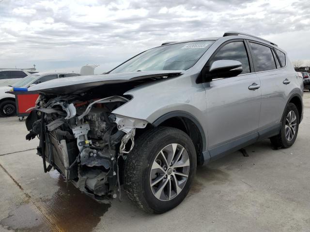 JTMRJREV7JD226981 - 2018 TOYOTA RAV4 HV LE SILVER photo 1