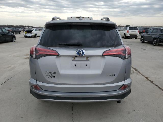 JTMRJREV7JD226981 - 2018 TOYOTA RAV4 HV LE SILVER photo 6