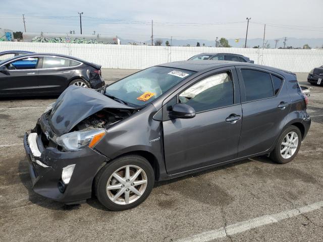 JTDKDTB31G1122859 - 2016 TOYOTA PRIUS C GRAY photo 1