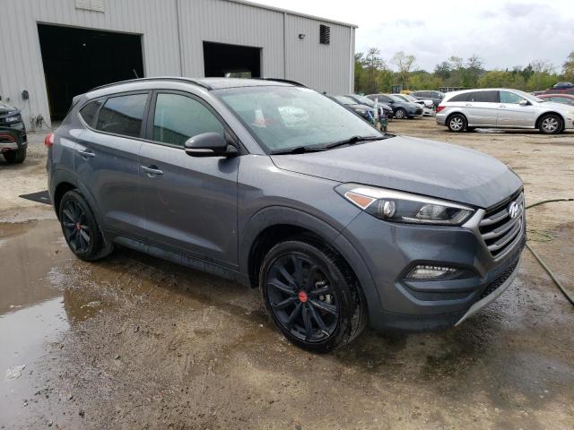 KM8J33A21HU493992 - 2017 HYUNDAI TUCSON LIMITED GRAY photo 4