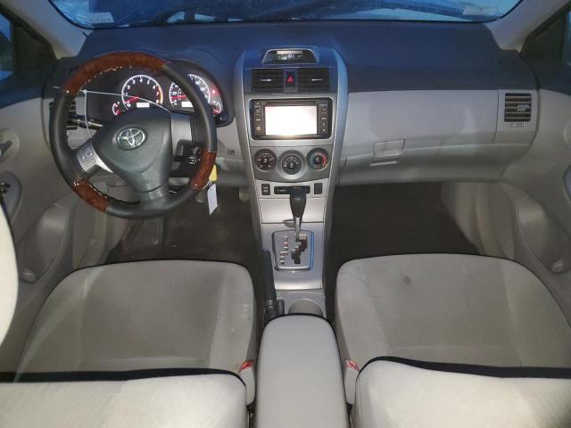 2T1BU4EE1DC930798 - 2013 TOYOTA COROLLA BASE Blau Foto 8