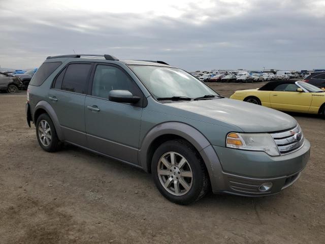 1FMDK05W78GA12976 - 2008 FORD TAURUS X SEL GRAY photo 4