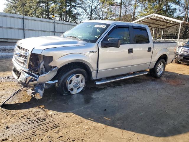 1FTEW1CM0EKE09944 - 2014 FORD F150 SUPERCREW SILVER photo 1