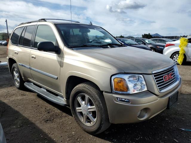 1GKDT13S572104210 - 2007 GMC ENVOY TAN photo 4