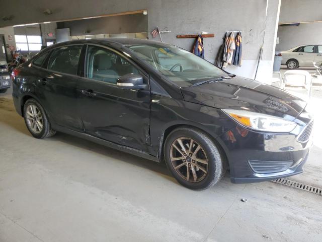 1FADP3F2XFL247708 - 2015 FORD FOCUS SE BLACK photo 4