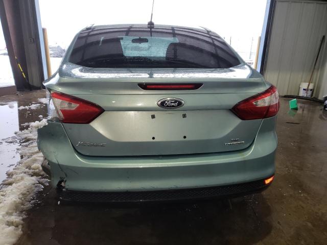 1FAHP3F28CL428125 - 2012 FORD FOCUS SE TURQUOISE photo 6