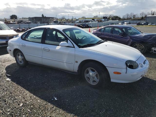 1FAFP53S8XA183951 - 1999 FORD TAURUS SE WHITE photo 4