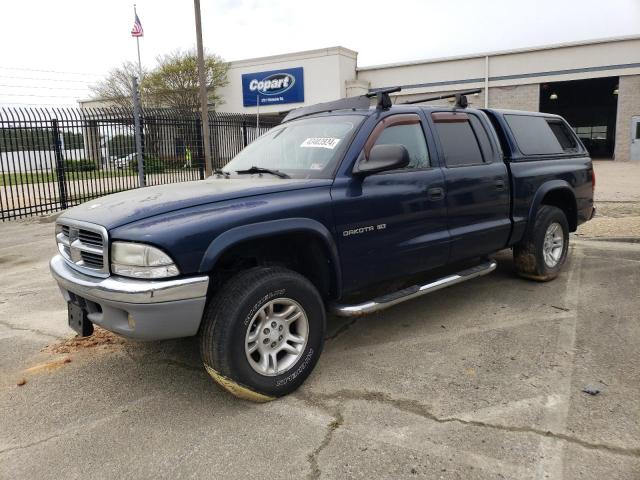 1B7GG2AN51S110743 - 2001 DODGE DAKOTA QUAD BLUE photo 1