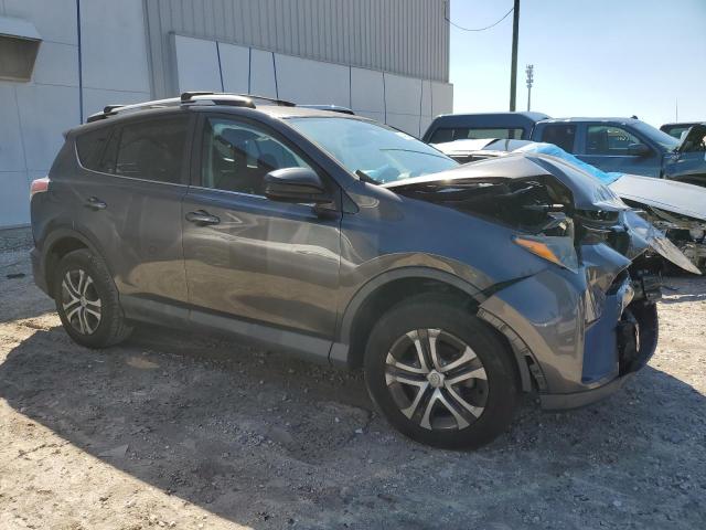 2T3ZFREV4GW307613 - 2016 TOYOTA RAV4 LE GRAY photo 4