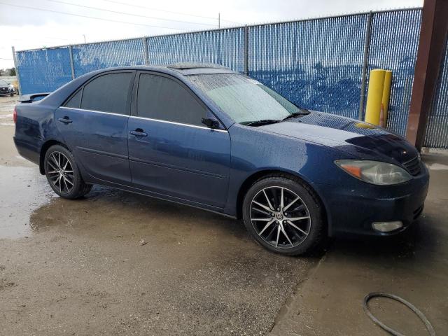 JTDBF30K520005613 - 2002 TOYOTA CAMRY LE BLUE photo 4