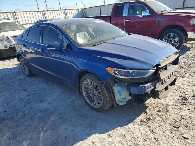 3FA6P0D9XJR192467 - 2018 FORD FUSION TITANIUM/PLATINUM BLUE photo 4