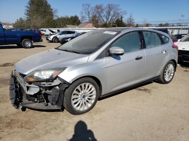 1FAHP3N23CL441298 - 2012 FORD FOCUS TITANIUM SILVER photo 1