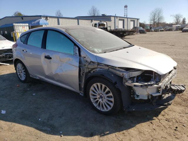 1FAHP3N23CL441298 - 2012 FORD FOCUS TITANIUM SILVER photo 4