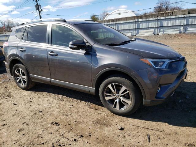 JTMRFREV0HJ125195 - 2017 TOYOTA RAV4 XLE GRAY photo 4