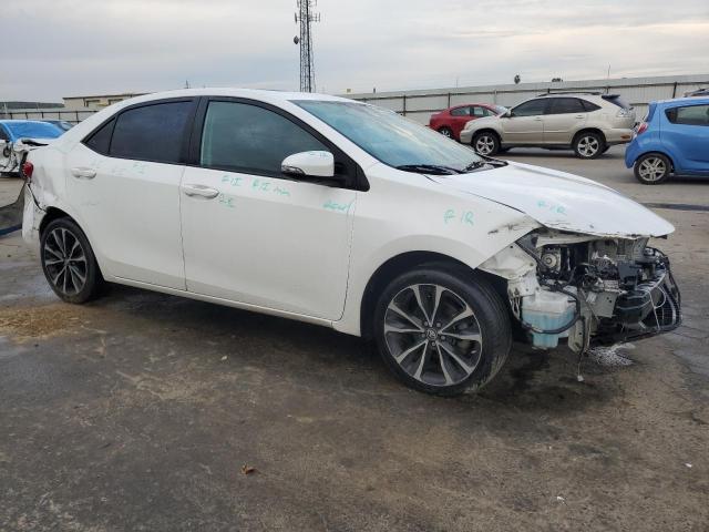 5YFBURHE8HP591696 - 2017 TOYOTA COROLLA L WHITE photo 4