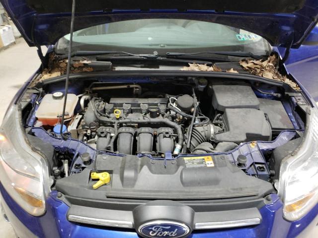 1FAHP3F23CL419381 - 2012 FORD FOCUS SE BLUE photo 11