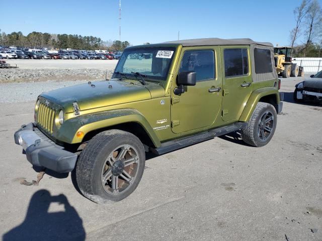 1J4BA5H12AL215809 - 2010 JEEP WRANGLER U SAHARA GREEN photo 1