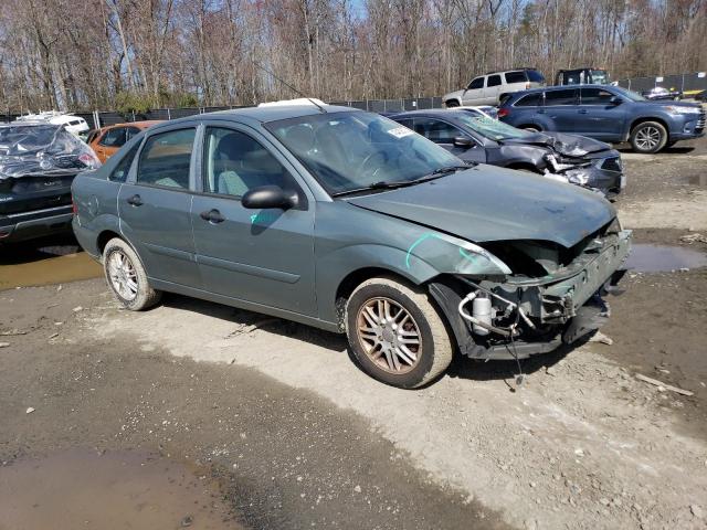 1FAFP34N26W163323 - 2006 FORD FOCUS ZX4 GRAY photo 4