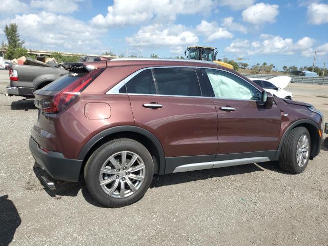 1GYFZCR42PF100156 - 2023 CADILLAC XT4 PREMIUM LUXURY PURPLE photo 4