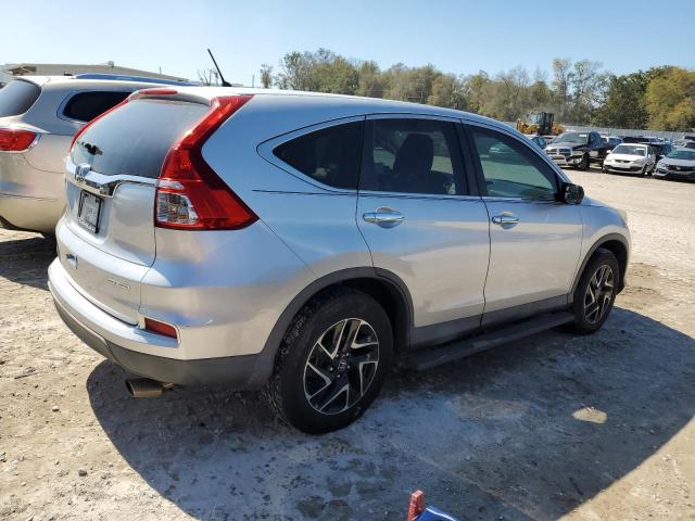 2HKRM3H43GH552013 - 2016 HONDA CR-V SE SILVER photo 3