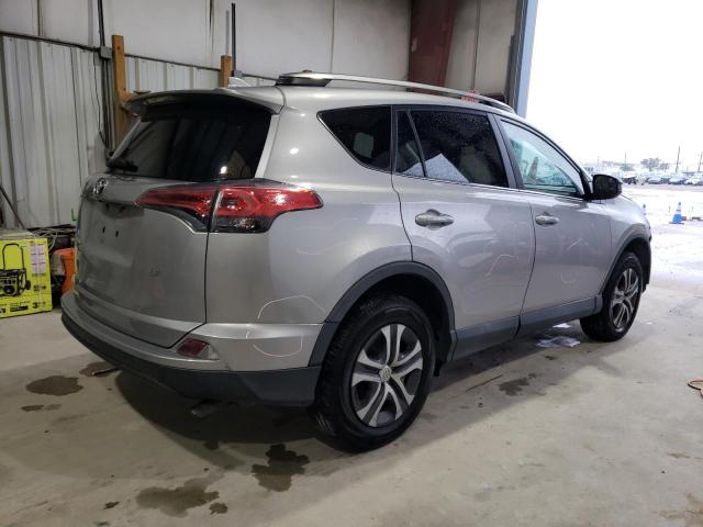 2T3ZFREV8HW356587 - 2017 TOYOTA RAV4 LE SILVER photo 3