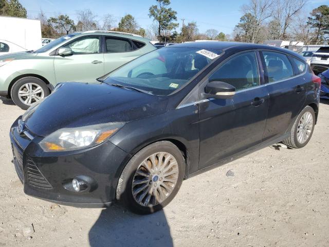 1FAHP3N2XCL318937 - 2012 FORD FOCUS TITANIUM BLACK photo 1