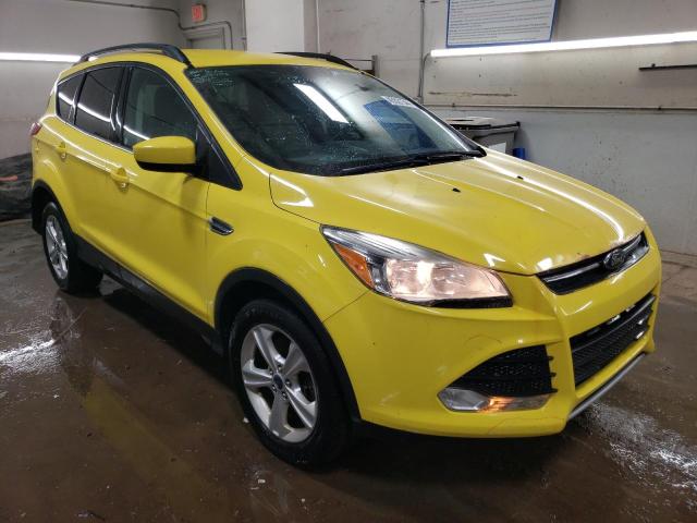 1FMCU9GX5EUC76520 - 2014 FORD ESCAPE SE YELLOW photo 4