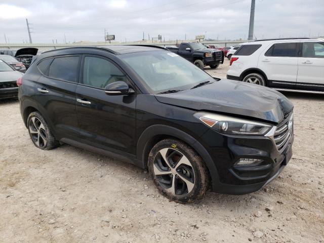 KM8J33A20GU222159 - 2016 HYUNDAI TUCSON LIMITED BLACK photo 4