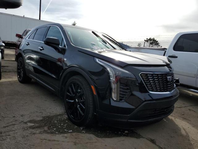 1GYFZBR41NF155494 - 2022 CADILLAC XT4 LUXURY BLACK photo 4