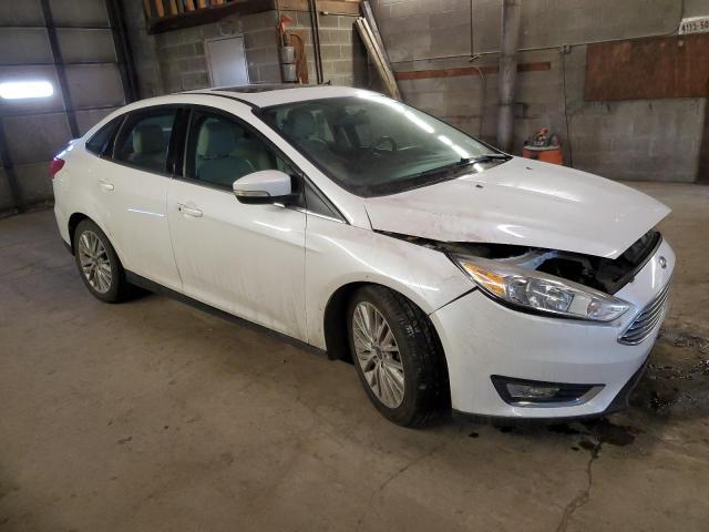 1FADP3J25HL268010 - 2017 FORD FOCUS TITANIUM WHITE photo 4