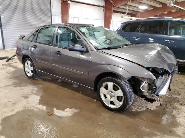 1FAHP34N87W164325 - 2007 FORD FOCUS ZX4 GRAY photo 4