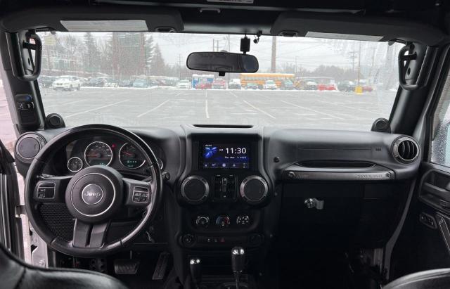 1J4HA3H16BL500982 - 2011 JEEP WRANGLER U SPORT فضي صورة 9