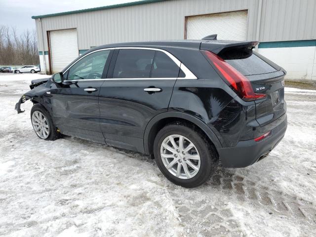 1GYAZAR47PF129604 - 2023 CADILLAC XT4 LUXURY BLACK photo 2