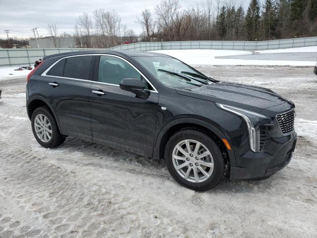 1GYAZAR47PF129604 - 2023 CADILLAC XT4 LUXURY BLACK photo 4