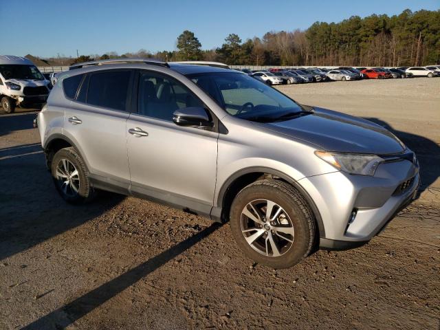 2T3WFREV6GW260300 - 2016 TOYOTA RAV4 XLE SILVER photo 4