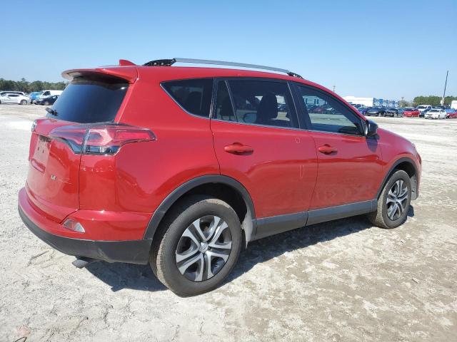 2T3ZFREV9HW345064 - 2017 TOYOTA RAV4 LE RED photo 3