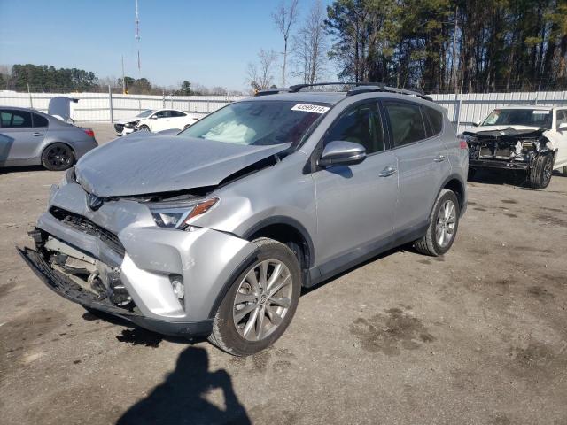 2T3YFREV8JW445075 - 2018 TOYOTA RAV4 LIMITED SILVER photo 1