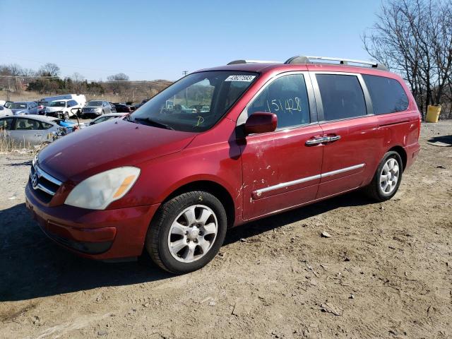 KNDMC233776015984 - 2007 HYUNDAI ENTOURAGE GLS RED photo 1