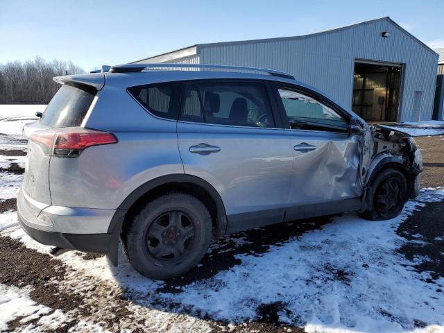 2T3BFREV7JW852679 - 2018 TOYOTA RAV4 LE SILVER photo 3