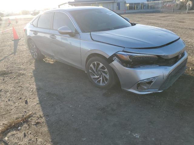 2HGFE2F24NH509366 - 2022 HONDA CIVIC LX SILVER photo 4