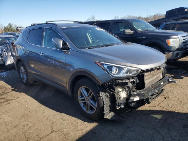 5NMZUDLB0HH015674 - 2017 HYUNDAI SANTA FE S GRAY photo 4